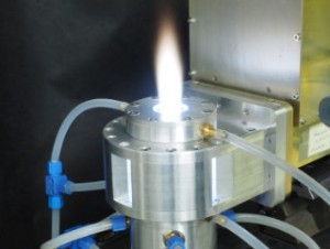 © IGVP, Universität Stuttgart Microwave plasma at atmospheric pressure: In a resonator system, microwaves ignite the gas flowing in and form a plasma, which is then blown into a reactor.